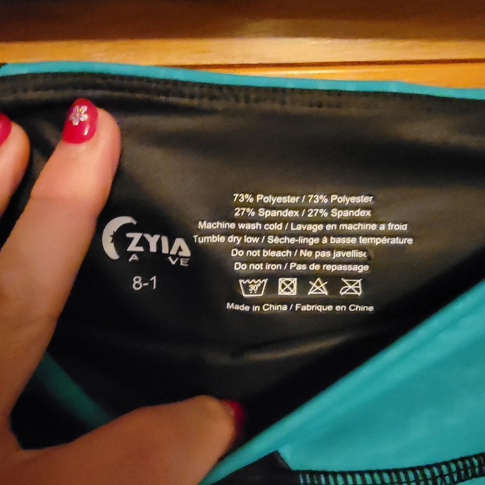 Zyia teal and black metallic leggings, size 8/10 - Picture 3 of 5